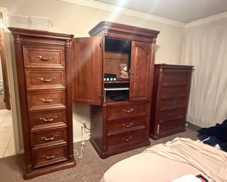 Complete solid-wood bedroom set originally purchased from The Oak Mill in Addison, a high-end furniture retailer. This is a matching, traditional suite from the early 2000s (not big-box furniture) with rich dark wood finish and heavy, well-built construction. Includes dresser with mirror, multiple chests (gentleman’s and lingerie), chest of drawers, and coordinating headboard/wall units. Quality craftsmanship throughout, sturdy and substantial pieces that have held up well. Originally over $6,600 new.