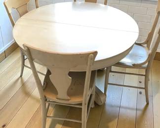 White Round Dining Table with Four Matching Chairs