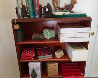 Mahogany Bookcase circa 1940. Vintage Christmas ornaments.