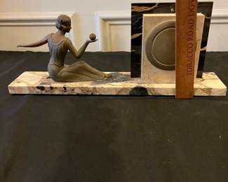 R173 - $125. Art Deco Onyx & Stone Figural Mantle Clock. 18" long  x 7" tall. No key, untested and assuming it is not working. 