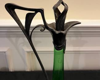 P49 - $125. Art Nouveau Carafe. Green Glass & Pewter. Measures 15" tall. 