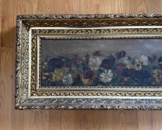 P46 - $175. Antique Oil Painting on Canvas of Pansies. Unsigned. Heavy Gold Gilt Frame in excellent antique condition. Measures 34" x 15.25".  Painting has one rip in the canvas that has been repaired with tape on the back - see photo. 