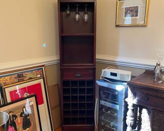 R133 - $65. Bar Cabinet with storage for wine, glasses & accessories. Single Drawer. Measures 18" wide x 13.5" deep x 70" tall. 