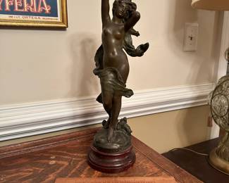 P64 - $125. Antique La Vague Par Moreau Lady Statue with Wooden Base painted with marbled look. Plaque on the bottom reads - "La Vague Par Hip. Moreau". Measures 20" tall. (I believe it is Spelter with bronze paint)