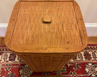 R240 - $85. Vintage Longaberger Laundry Basket. Measures 17.25" square x 22.5" tall. Has plastic liner which is in excellent condition!