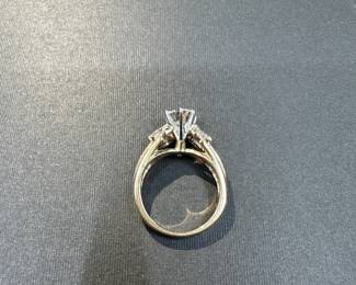 A1 - $1500. Ladies Diamond Engagement Ring. Size 6/6.5. 14KT "AB" stamped inside. 1 large center Diamond with Round Cut and 6 Marquise Cut surrounding Diamonds. (Retail was 7k)