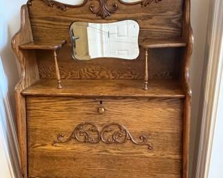 R139 - $325. Antique Larkin Co. Victorian Oak Drop Front Secretary with Bookshelf and Mirror. Beautiful condition! Measures 30" wide x 12" deep x 63" tall. 