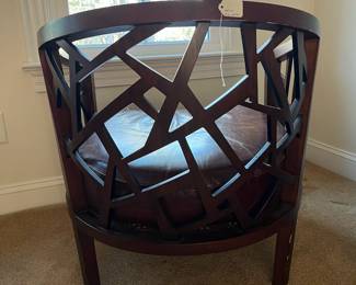 P100 - $150. Crate & Barrel Ankara Chair. Leather cushion & Caning are in ver good condition! One back leg has scrape marks (you don't see if they're in the corner!) Measures 29.5" wide x 27" deep x 30" tall. Floor to seat is 17". 