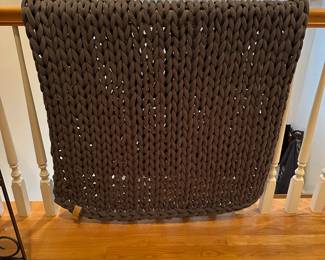R247 - $75. Bearaby Cotton Napper Weighted Blanket. Measures 38" x 66" but it does stretch larger. 