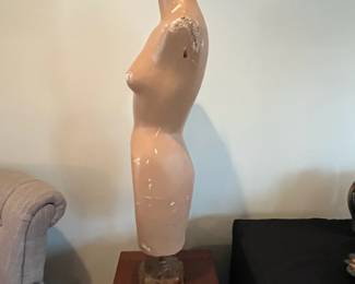 R107 - $75. Antique Paper Mache Female Torso Mannequin on Metal Stand. Measures 14" wide x 41.5" tall. 