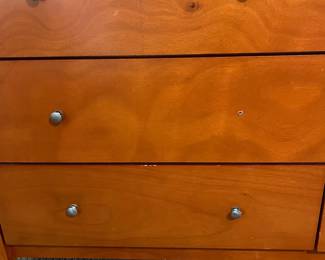 P82 - $85. 6 Drawer Dresser. Pressed Wood. All drawer slide - missing 1 knob. Top has some minor surface scratches. Measures 63.5" x 17.5" x 33.5" tall. 