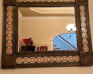 P9 - $65. Punched Tin Framed Mirror. Made in Mexico. Measures 29" x 25". 