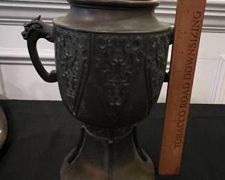 R196 - $60. 2 Piece Bronze Floral Usubata. Measures 12" across x 11.5" tall. 