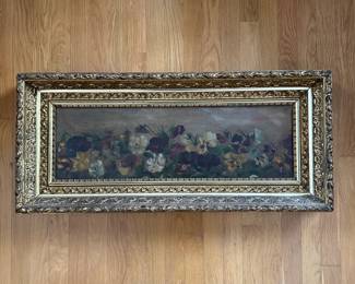 P46 - $175. Antique Oil Painting on Canvas of Pansies. Unsigned. Heavy Gold Gilt Frame in excellent antique condition. Measures 34" x 15.25".  Painting has one rip in the canvas that has been repaired with tape on the back - see photo. 
