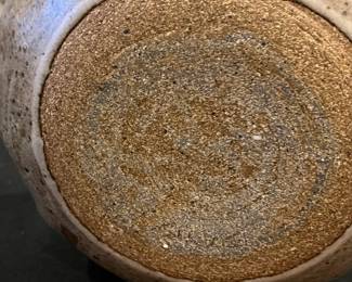 P67 - $20. Pottery Vase signed "Davis". Measures 9" wide x 8" tall. 