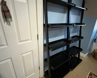 R113 - $40 Each. 2 Available. Leaning Shelves. Measures 25.75" x 14.5" x 75" tall. Both show some wear but still sturdy!
