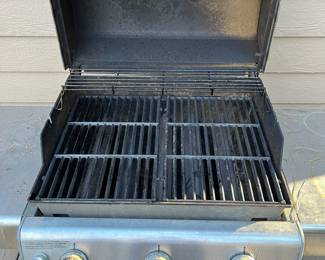 R169 - $100. Weber Genesis Propane Grill. Tank Included. Needs cleaned up and a little work but lots of life left!