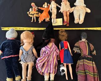 R129 - $60. Lot of 10 vintage dolls. 