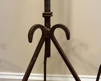 R260 - $175. 19th Century Iron Floor Candlestick holders. Measures 15" wide x 55" tall. 