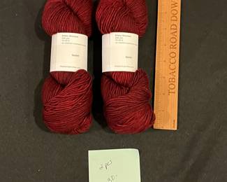 R235 - $30. 2 Skeins Plucky Knitter "Scarlet"