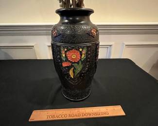 P66 - $40. Black Tokanabe Ware Vase. 1920s. Bottom is stamped "Made in Japan". Measures 7" at the widest x 12" tall. 