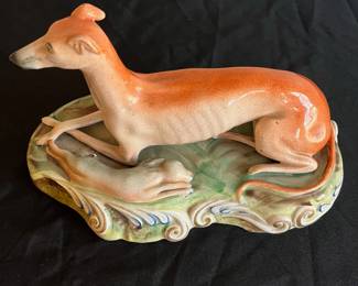 P92 - $95. Staffordshire Greyhound with hare. Does have crazing, chips on the bottom
