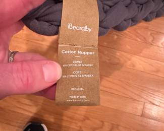 R247 - $75. Bearaby Cotton Napper Weighted Blanket. Measures 38" x 66" but it does stretch larger. 