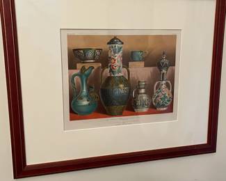 P25 - $50 Pair of Framed Prints. Top is titled "Enamelled Ware from India" Bottom is "Coloured Earthenware From Algeria  & Turkey" Framed each Measures 22" x 18". 
