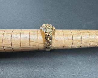 A7 - $300. 10kt Gold - Size 8. Gold band with 8 small accent diamonds. 