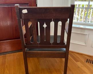 P11 - $75. Mission Style Single Arm Chair with Leather Seat. Measures 25" wide x 23" deep x 36" tall. 