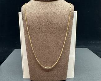 A8 - $500. 14kt Gold Chain. Looks like a box chain and every few has a larger space. Measures 24" long. 