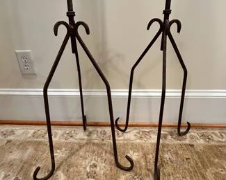R260 - $175. 19th Century Iron Floor Candlestick holders. Measures 15" wide x 55" tall. 
