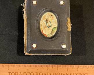 P59 - $30. 1800s Small Photo Album - no photos included. Measures 4" x 5.5" x 3" tall. 