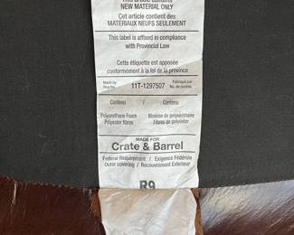 P100 - $150. Crate & Barrel Ankara Chair. Leather cushion & Caning are in ver good condition! One back leg has scrape marks (you don't see if they're in the corner!) Measures 29.5" wide x 27" deep x 30" tall. Floor to seat is 17". 