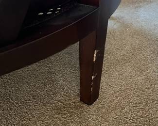 P100 - $150. Crate & Barrel Ankara Chair. Leather cushion & Caning are in ver good condition! One back leg has scrape marks (you don't see if they're in the corner!) Measures 29.5" wide x 27" deep x 30" tall. Floor to seat is 17". 