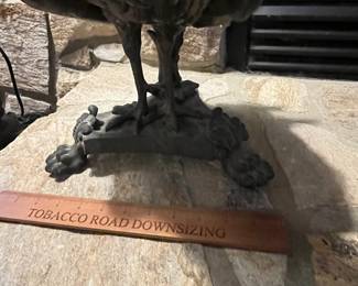 P61 - $40. Heavy Metal Peacock that used to be part of a fireplace screen (feathers missing) Has hole in the chest. Measures 20" tall. 