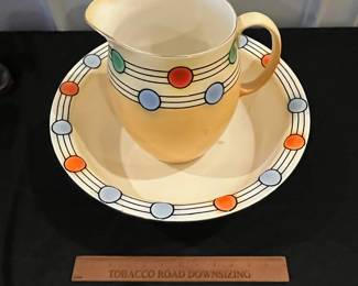 P60 - $100. Vintage Art Deco Style Wash Bowl & Pitcher Set. Bottom of the Pitcher is stamped "Persian". No issues noted beyond minor, normal crazing, some wear on the gold trim. Bowl is 15.5" wide x 5" tall. Pitcher is 10" tall. 