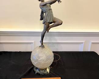 R158 - $150. Emile Carlier Art Deco Bronze Dancer Lamp. Needs to be rewired. Her right arm has been repaired. Measures 9" x 25.5" tall. *Needs* to be rewired - can not be used as is. Stamped under her dress Made in France. 