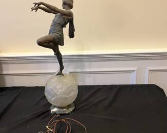 R158 - $150. Emile Carlier Art Deco Bronze Dancer Lamp. Needs to be rewired. Her right arm has been repaired. Measures 9" x 25.5" tall. *Needs* to be rewired - can not be used as is. Stamped under her dress Made in France. 