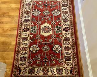 R164 - $175. Beautiful Kazak Area Rug. Normal wear from gently use. Measures 35.75" x 58"