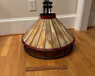 R213 - $85. 2 Piece Stained Glass Light Fixture. One small crack in a small red piece otherwise great condition! Stained Glass slides on top of metal frame. 