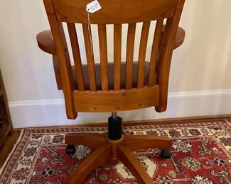 R151 - $50. Swivel, Rolling Office Chair with leather seat. Measures 25.25" wide x 25" deep x adjust from 32.5 - 36" tall. 