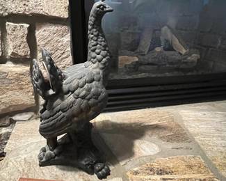 P61 - $40. Heavy Metal Peacock that used to be part of a fireplace screen (feathers missing) Has hole in the chest. Measures 20" tall. 