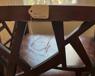 P100 - $150. Crate & Barrel Ankara Chair. Leather cushion & Caning are in ver good condition! One back leg has scrape marks (you don't see if they're in the corner!) Measures 29.5" wide x 27" deep x 30" tall. Floor to seat is 17". 