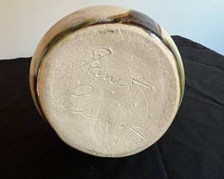 P94 - $15. Janet Resnik Pottery Pitcher. Measures 7.5" tall. No issues noted. 