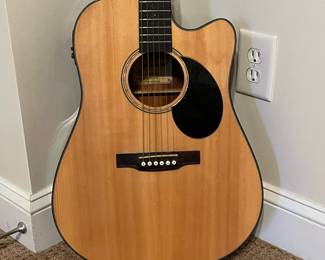 R244 - $50. Jasmine Electric Guitar. Model JD-36CE-NAT-U. 