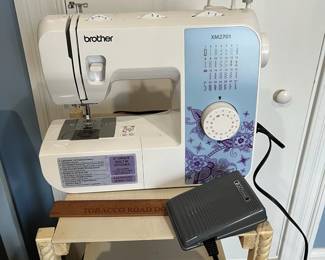 R174 - $50. Brother Sewing Machine Model XM2701. Lightweight sewing and embroidery machine with 27 Stitches. Powers on and goes!