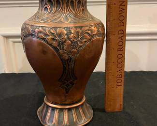 P52 - $20. Copper Vase. Measures 6" wide x 9" tall. (Base is a little bent but it won't tip over!)