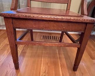 R134 - $50. Single Chair Solid Wood. Antique or very vintage. The chair was once caned and later a solid piece was placed on the top. Measures 22" wide x 17.25" x 42.5" tall. 