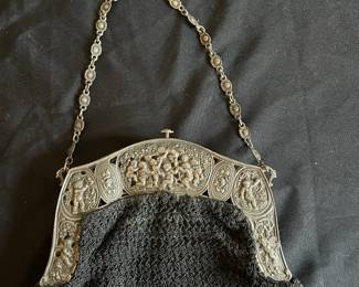 R178 - $50. Silver Plated Cherub Victorian Purse Frame and Handle. I don't think the bag & lining are original but they are in very good condition! Latch on the purse does work. 